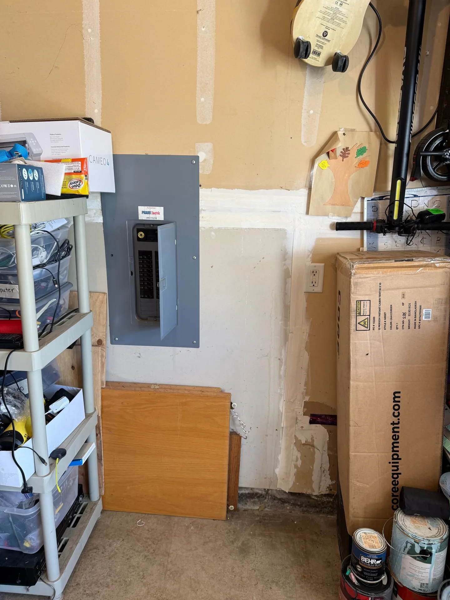 Garage wall and existing main panel in Fishers Landing, Vancouver WA before the Wallbox EV charger install, showing clean wall space adjacent to the panel