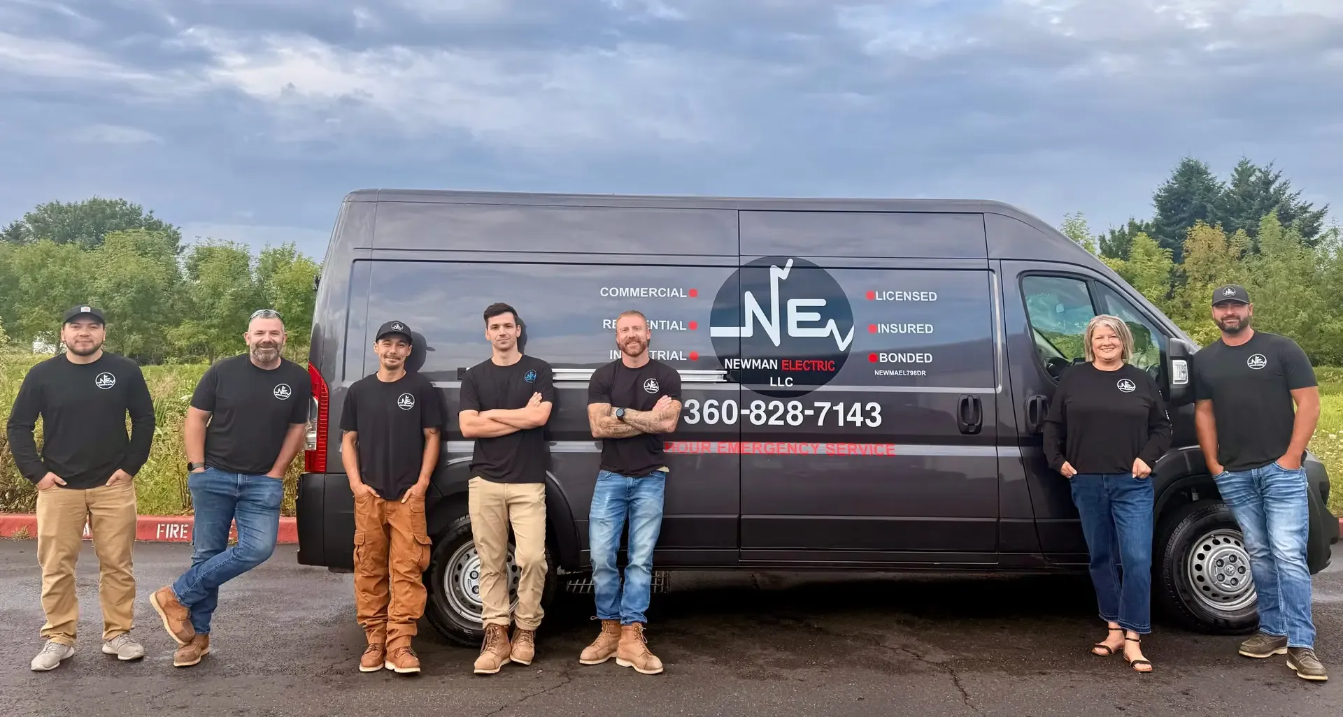 Newman Electric team in front of service van in Vancouver WA