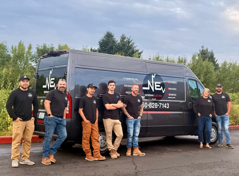 Custom chandelier installation by Newman Electric