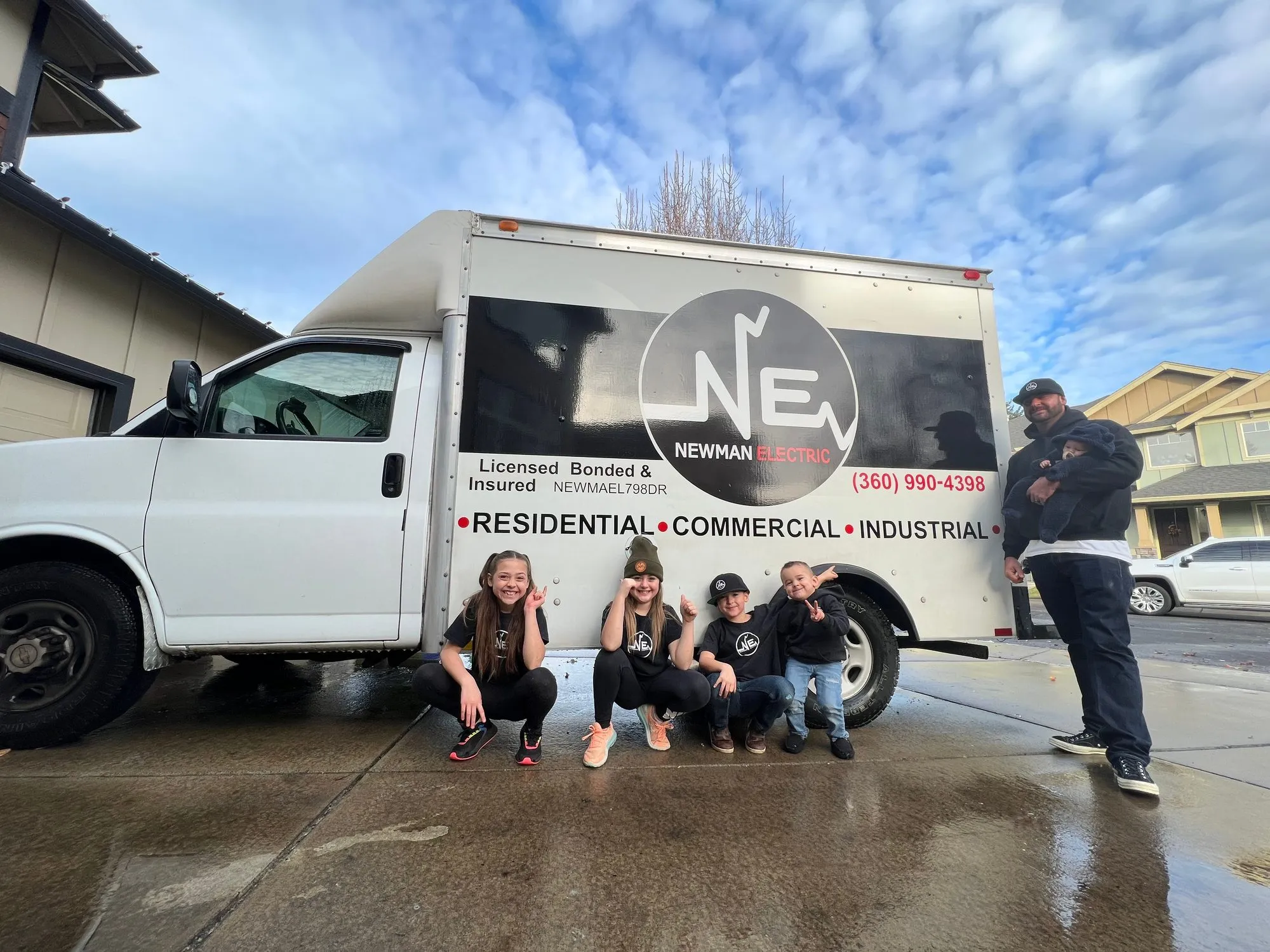 Newman Electric service vans at a dedicated circuit installation
