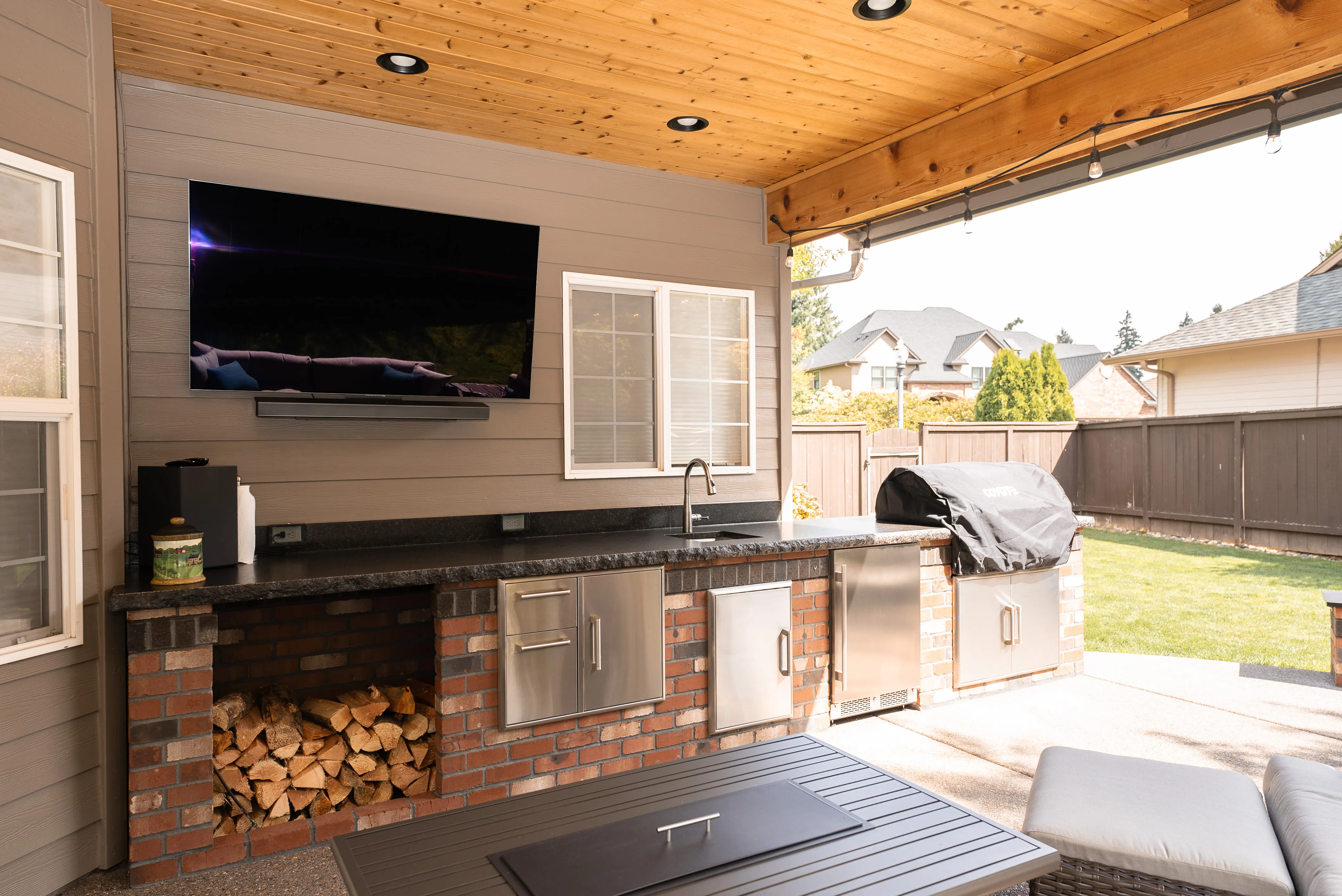 Outdoor patio lighting installation with recessed and accent lights by Newman Electric