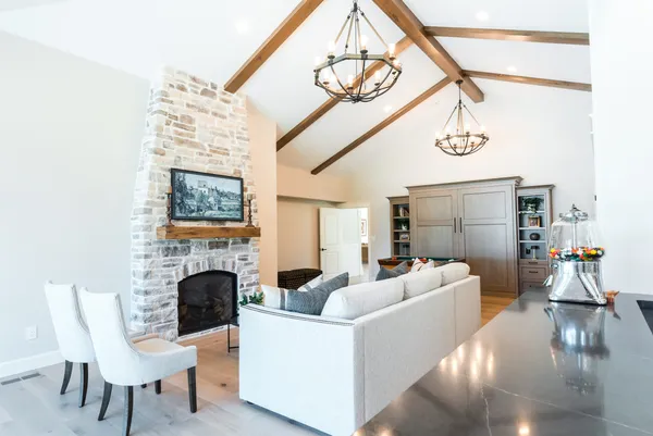 Custom living room with chandelier lighting installed by Newman Electric